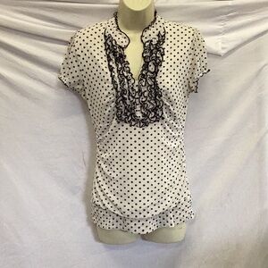 Maurices polka dotted, ruffled collared blouse.
